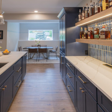 Lenexa, Kansas Basement Remodel with Speakeasy-Inspired Entertaining Bar