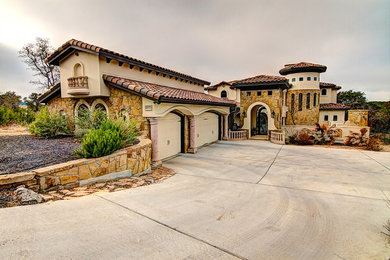 Inspiration for a mediterranean exterior home remodel in Austin