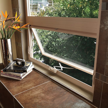 Tuscany Series awning window with clean look and tan finish