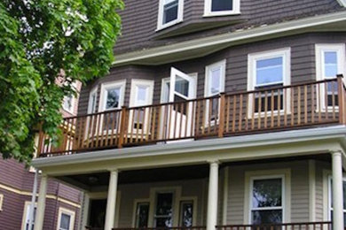 Inspiration for a brown three-story exterior home remodel in Boston