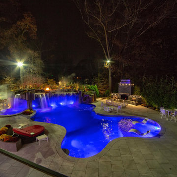 Alpine New Jersey - Night view of custom glass tile swimming pool and spa with C