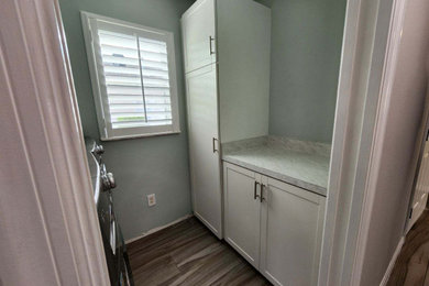 Galley laundry room photo in Other with shaker cabinets, white cabinets, laminate countertops and white countertops