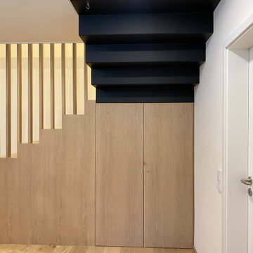 Holztreppe als Stauraum