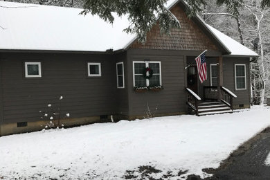 Small craftsman exterior home idea in Other