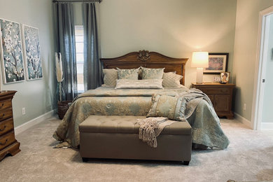 Mid-sized elegant master bedroom photo in Other