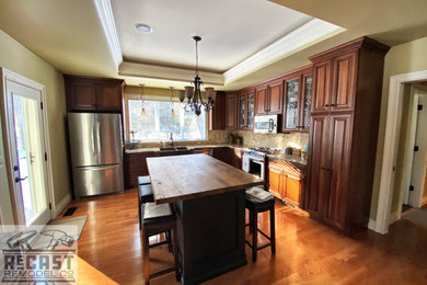 Farmhouse home design photo in Chicago