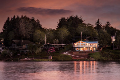 Beach style home design photo in Portland
