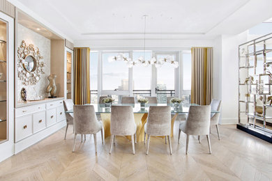 Example of a large trendy light wood floor and beige floor dining room design in Montreal
