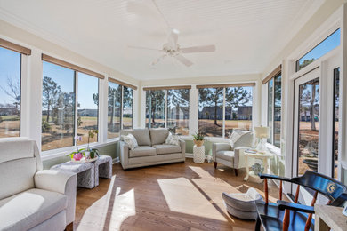 Example of an arts and crafts sunroom design in Charleston