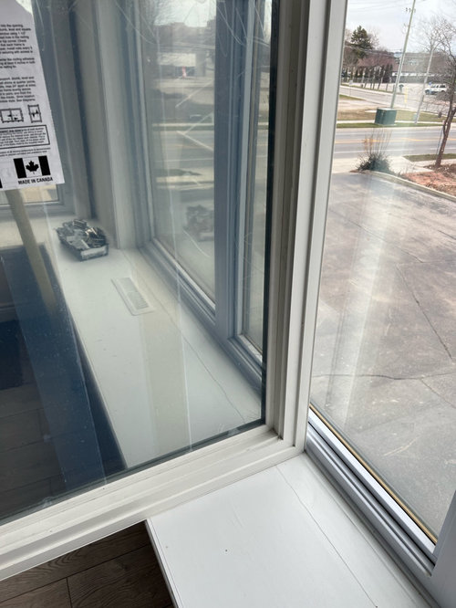 Black exterior vinyl windows and white interior