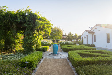 Design ideas for a huge mediterranean full sun backyard landscaping in San Diego.