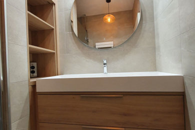 Inspiration for a medium sized modern shower room bathroom in Lyon with glass-front cabinets, brown cabinets, a built-in shower, grey tiles, cement tiles, grey walls, ceramic flooring, a trough sink, wooden worktops, grey floors, a hinged door, beige worktops, a single sink and a built in vanity unit.