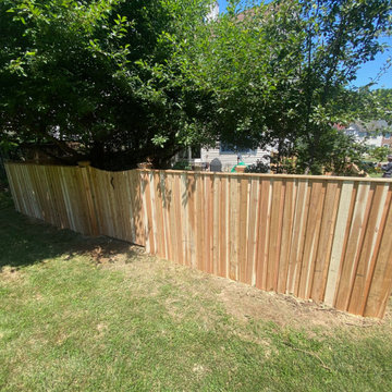 Cedar board and batten fence