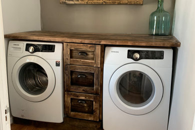 Farmhouse laundry room photo in Other