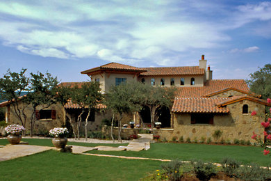 Mediterranean exterior home idea in Austin