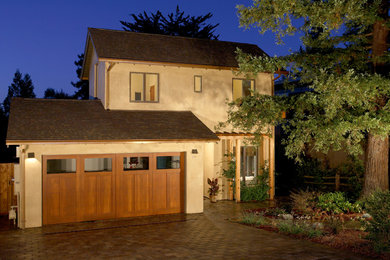 Mid-sized trendy beige two-story stucco gable roof photo in San Francisco