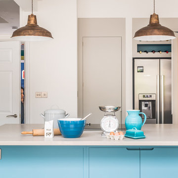 Stylish Blue Accented Kitchen with Walk In Larder