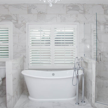 Contemporary Floor to Ceiling Tiled Master Bathroom
