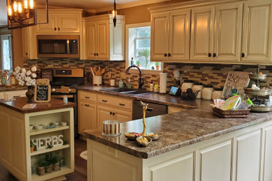 Example of a cottage kitchen design in Other