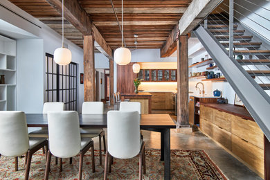 Photo of an industrial dining room in Raleigh.