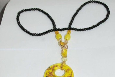 'Swinging' necklaces