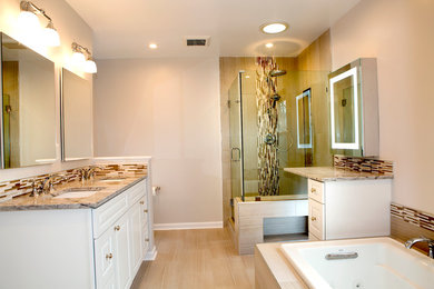 Inspiration for a large transitional master beige tile and porcelain tile porcelain tile bathroom remodel in DC Metro with raised-panel cabinets, white cabinets, beige walls, an undermount sink and granite countertops