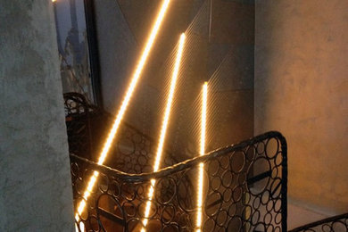 Large trendy staircase photo in Other