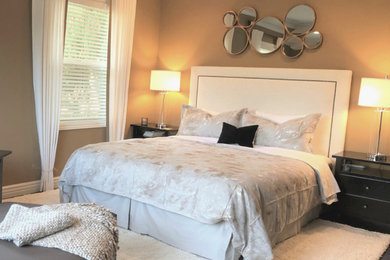 Bedroom - mid-sized transitional master bedroom idea in Orange County with brown walls