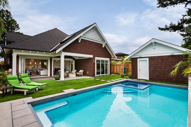 Hot tub - large coastal backyard concrete and rectangular aboveground hot tub idea in Vancouver