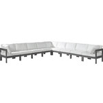Meridian Furniture - Nizuc Water Resistant Patio L-Shaped Modular Sectional, White, 9-Piece: 6 Armless Chair, 3 Corner Chair, Dark Gray Aluminum Frame - Pick and choose your favorites from the Nizuc collection to create a modular seating group the whole gang will enjoy. The sturdy aluminum frame provides dependable support for friends and family as they relax and unwind, and the resilient white water resistant fabric stands up to the elements without losing its beautiful demeanor, so you can count on it lasting for the long haul. Latches beneath these seating pieces help you easily attach them to one another for convenient setup.