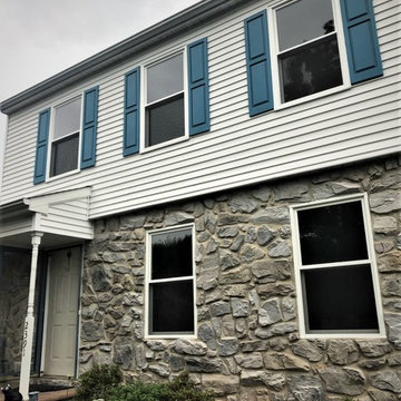 Installing Marvin Infinity Double Hung Windows with White Exterior on Home in PA