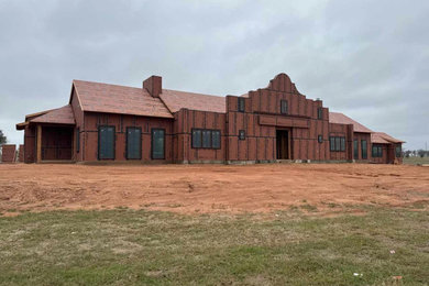 Rustic exterior home idea in Houston