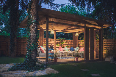 Example of an island style exterior home design in Other