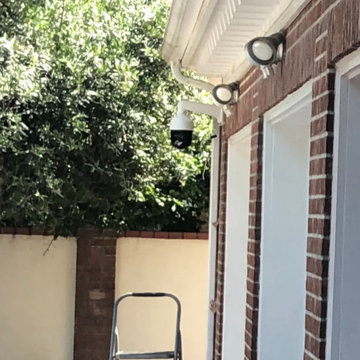 Installation of high definition PTZ cameras in a residential home by SOS.