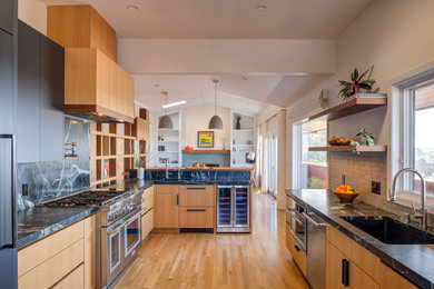 Inspiration for a 1960s kitchen remodel in San Francisco with gray backsplash, porcelain backsplash and stainless steel appliances