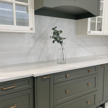 Bespoke Sage Green Transitional Kitchen Showroom - Greater Vancouver