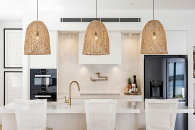 This is an example of a beach style kitchen in Newcastle - Maitland.