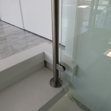 Aker Res Remodel. Glass, Steel and Pure White Treads