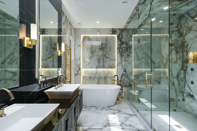 Bathroom - master multicolored tile and marble tile double-sink bathroom idea in Toronto with black cabinets, tile countertops, a hinged shower door, black countertops and a floating vanity