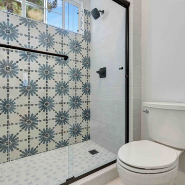 Bathroom Remodel in San Clemente with Bold Pattern Tile Shower with Black Accent