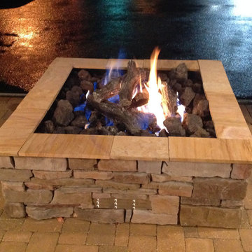 Custom square outdoor gas log fire pit by Fine's Gas