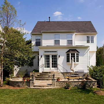 Large Kitchen Addition Opens to Patio for Enhanced Family Living