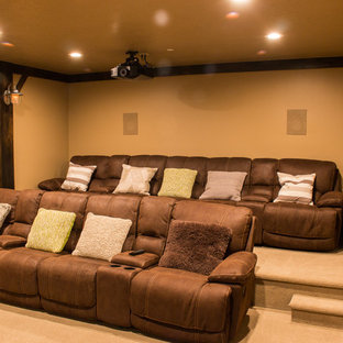 Design ideas for a medium sized traditional enclosed home cinema in Salt Lake City with beige walls, carpet, a projector screen and beige floors.