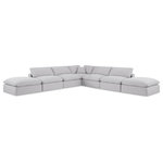 Meridian Furniture - Comfy Upholstered L-Shaped Modular Sectional, White, 7-Piece: 4 Armless Chair, 1 Corner Chair, 2 Ottoman, Linen Textured Fabric - Give your space a whole new look with this white Comfy linen textured fabric sectional. This handsome sectional fits nicely with other items in the Comfy collection and is a versatile seating option designed for adaptability, comfort and style. Wrapped in rich white durable linen textured fabric upholstery, this sectional offers a plush embrace of overstuffed down feather cushions, carefully crafted to deliver the highest level of comfort. The perfect seat for creating an oasis for relaxation, this sectional has thick foam surrounding its frame for added support and coziness.