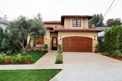 Large mediterranean exterior home idea in Los Angeles
