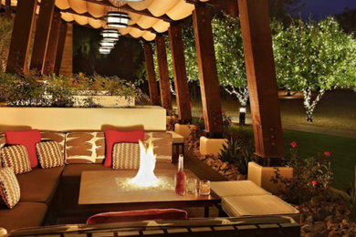 Patio - french country patio idea in Austin