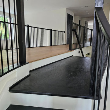Project #130 | Curved Staircase with Wraparound Balcony