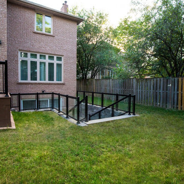 2022 Projects Gallery - Backyard Deck, Glass Railings and Coping Lights