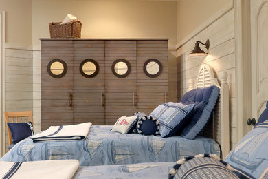 Beach style guest bedroom photo in St Louis with beige walls