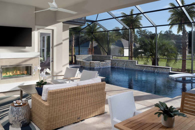 Island style home design photo in Miami